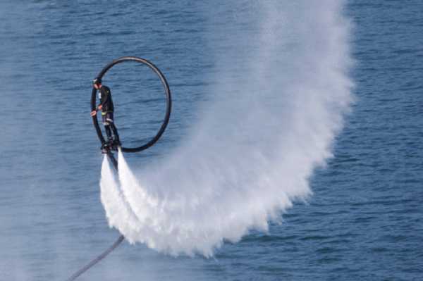 27 August 2022 - 16:55:40
And then he puts the power on. Flips, rolls and somersaults. Great fun.
------------ 
Flyboarding at Dartmouth Regatta